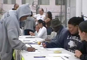 ALLERT volunteers sign in on the day of a neighborhood canvass