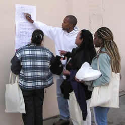 An ALLERT organizer trains door-knockers in Los Angeles.